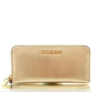 Authentic Michael Kors gold leather zip up wallet